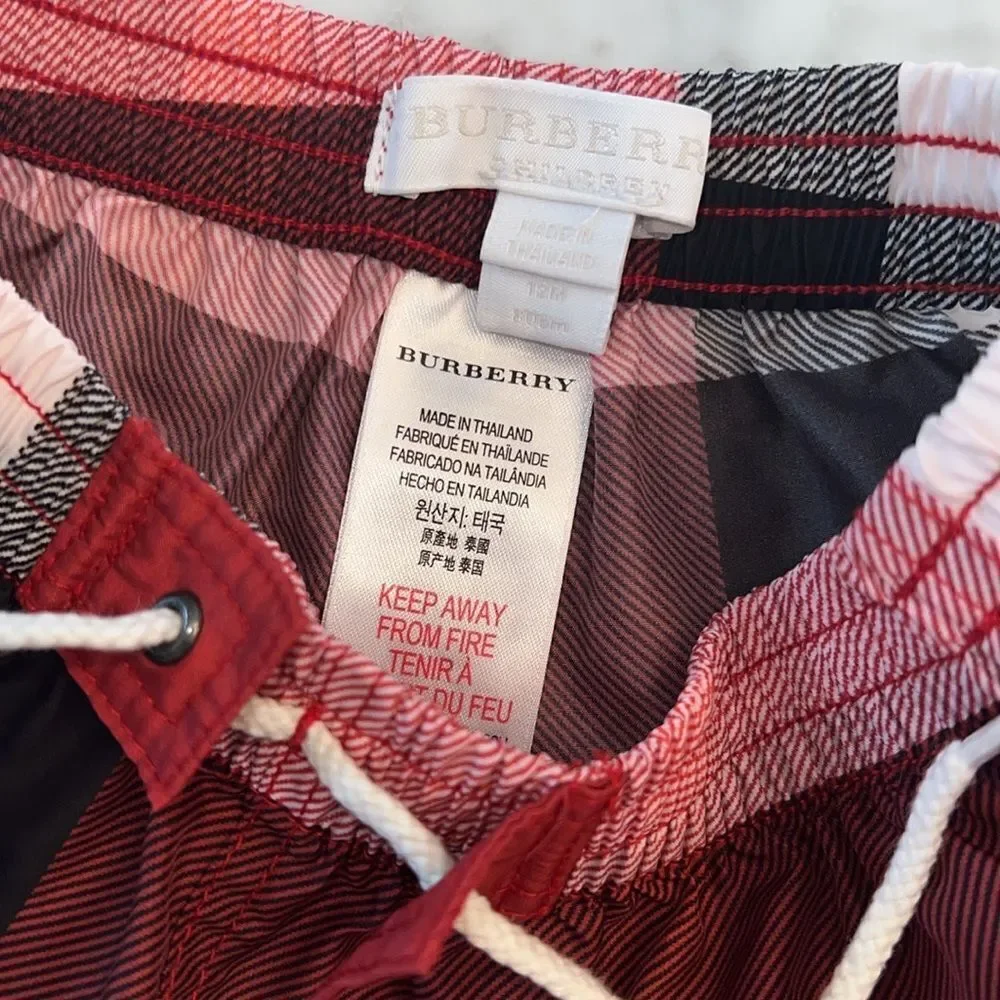 BURBERRY BOYS RED SWIM SHORTS 12M
